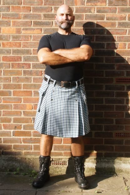 Green brown black white dog tooth check kilt